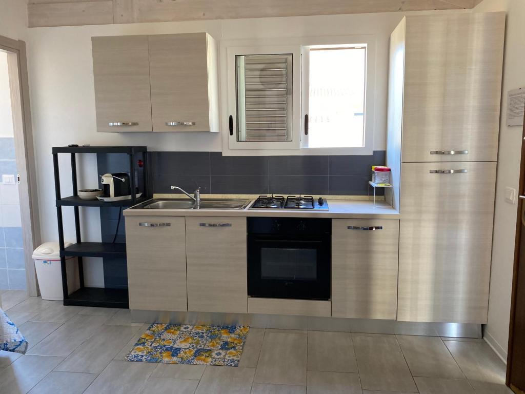 Kuchyň nebo kuchyňský kout v ubytování Casa azzurra