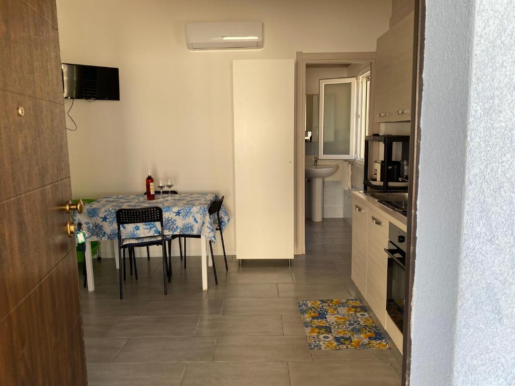 Kuchyň nebo kuchyňský kout v ubytování Casa azzurra