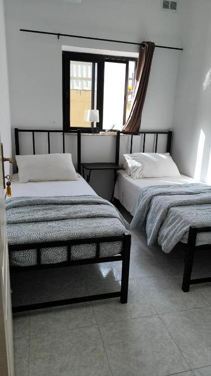 Postel nebo postele na pokoji v ubytování Le 3 isole