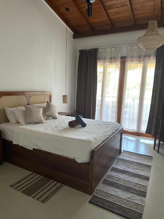 Postel nebo postele na pokoji v ubytování Casa Tharin Madiha