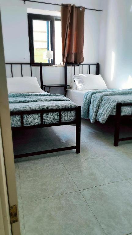 Postel nebo postele na pokoji v ubytování Le 3 isole