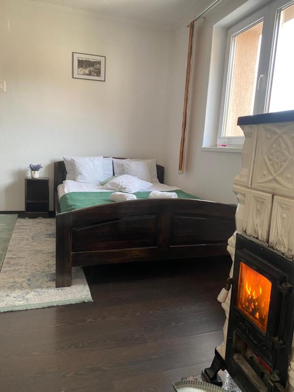 Postel nebo postele na pokoji v ubytování Apartament Borsec
