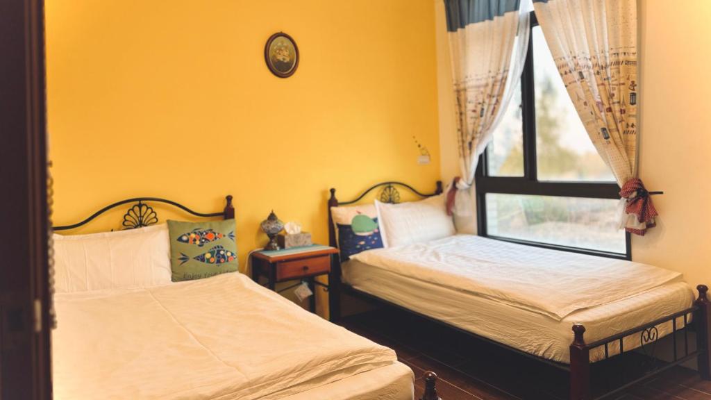 Postel nebo postele na pokoji v ubytování Kinmen 2 Home Puju Homestay