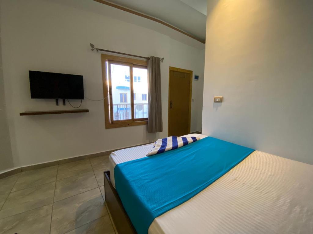 Postel nebo postele na pokoji v ubytování Seaview Hotel Dahab