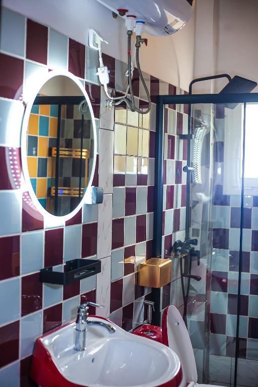 Koupelna v ubytování flamboyant hôtel