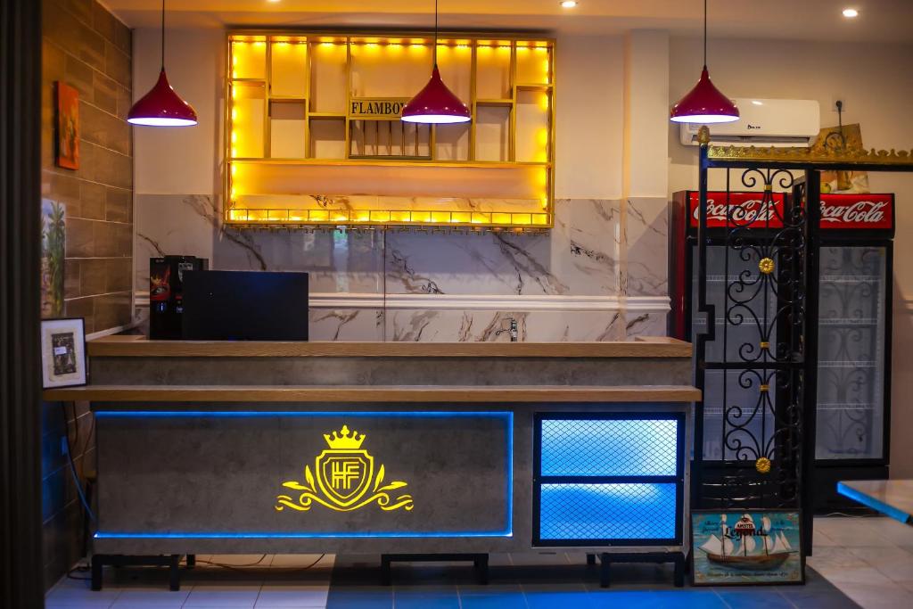 Kuchyň nebo kuchyňský kout v ubytování flamboyant hôtel