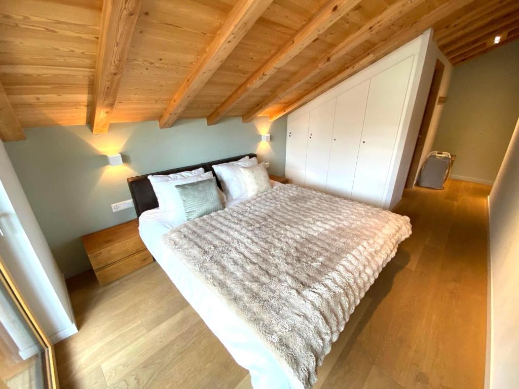 Postel nebo postele na pokoji v ubytování Derby ski-in/out