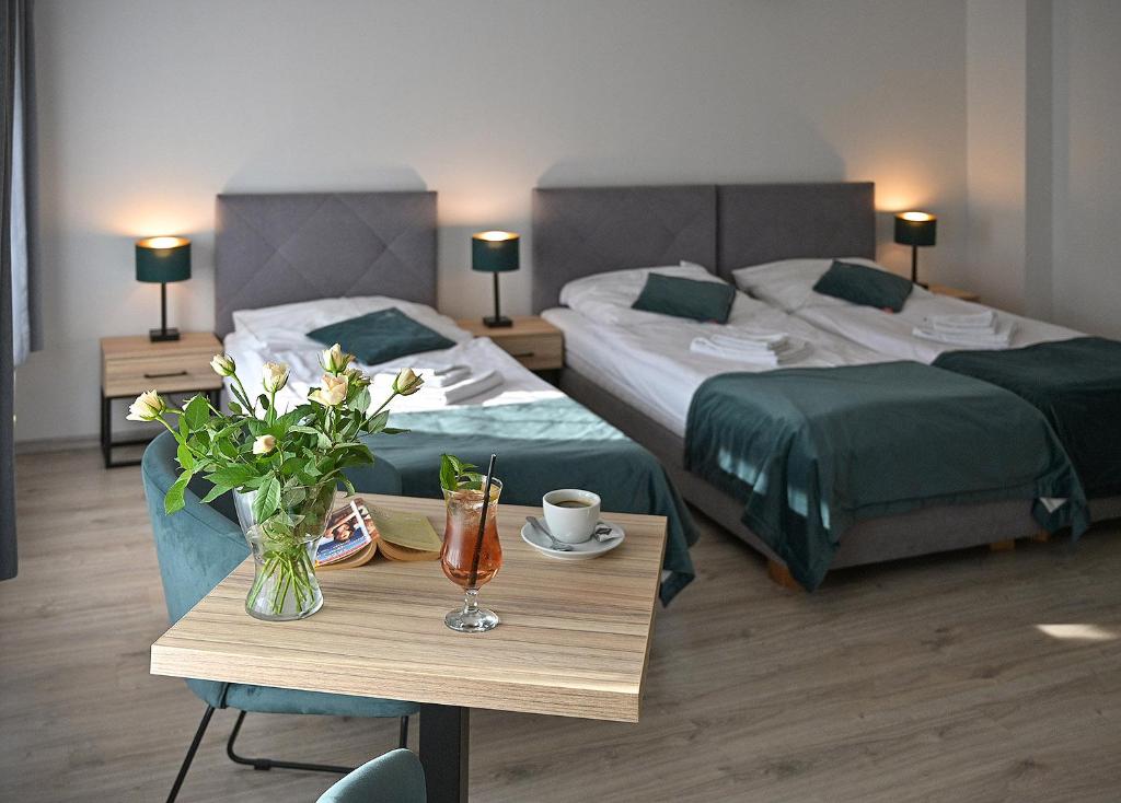 Posteľ alebo postele v izbe v ubytovaní Dobrzyński Resort Hotel Nefryt