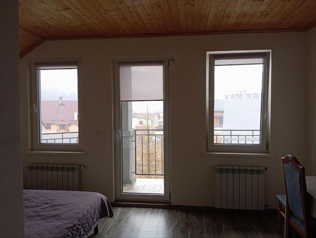 Postel nebo postele na pokoji v ubytování Готель Ципа