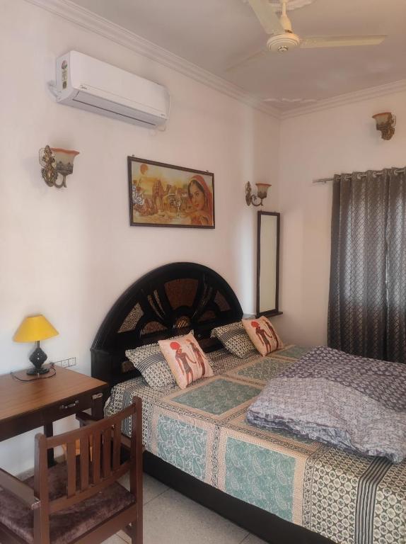 Postel nebo postele na pokoji v ubytování Ardas Villa Bikaner