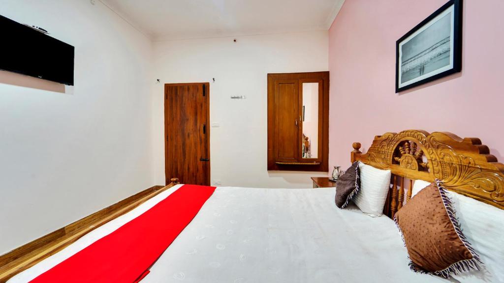 Ένα ή περισσότερα κρεβάτια σε δωμάτιο στο Coolspot Cottage
