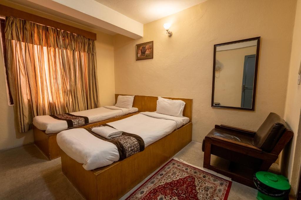 Postel nebo postele na pokoji v ubytování Hotel Nana