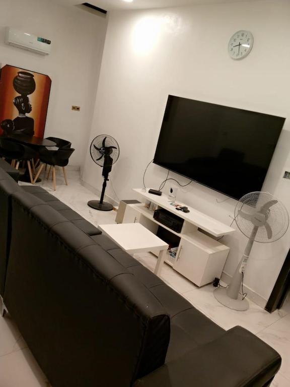 TV a/nebo společenská místnost v ubytování Lovely one bedroom flat