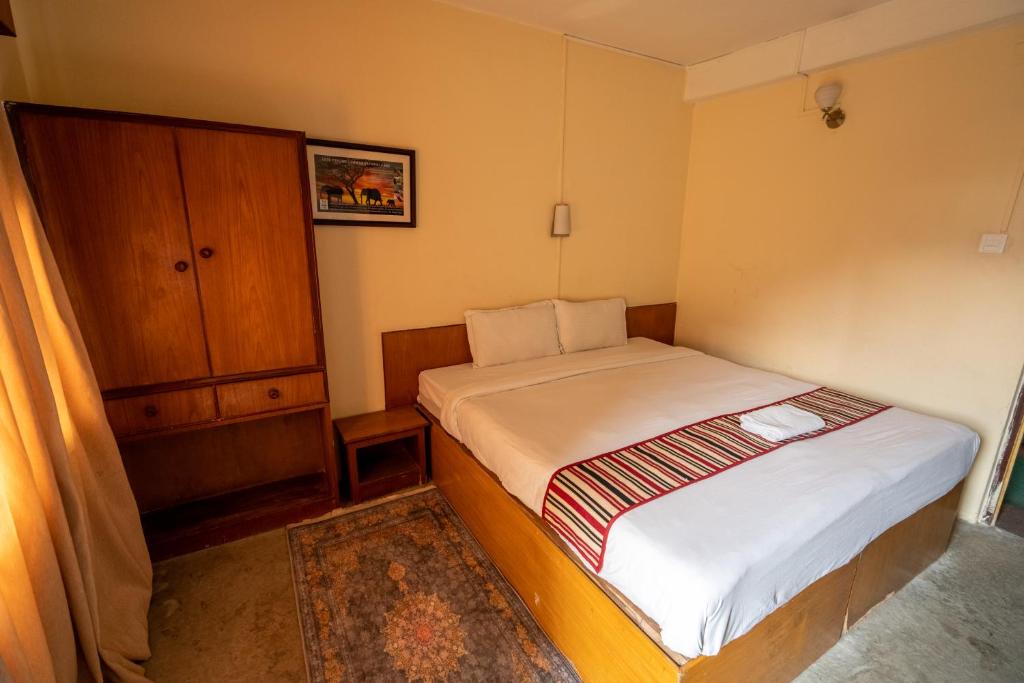 Postel nebo postele na pokoji v ubytování Hotel Nana
