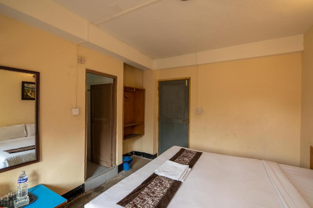 Postel nebo postele na pokoji v ubytování Hotel Nana