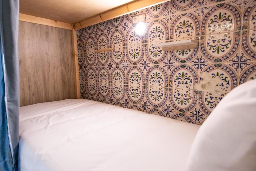 Postel nebo postele na pokoji v ubytování Smile Hostel