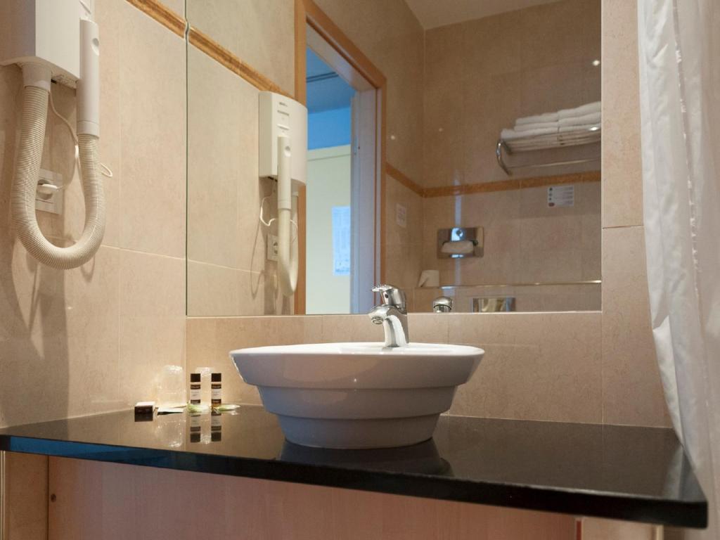 Koupelna v ubytování Hotel Tristar