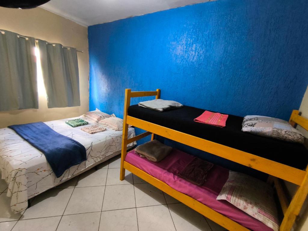 Voodi või voodid majutusasutuse Ouropreto3quarto103 toas