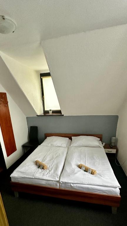 Postel nebo postele na pokoji v ubytování Pension Plestil
