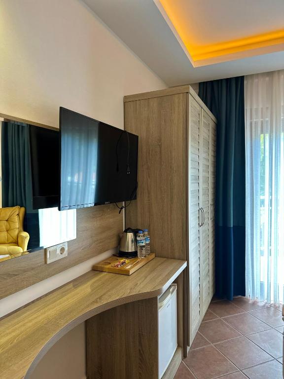 Kuchyň nebo kuchyňský kout v ubytování The Kumsal Hotel Oludeniz