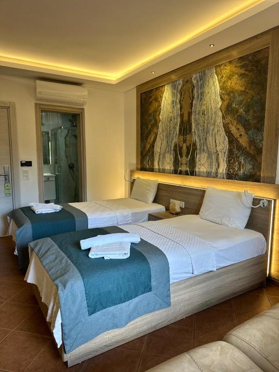 Postel nebo postele na pokoji v ubytování The Kumsal Hotel Oludeniz
