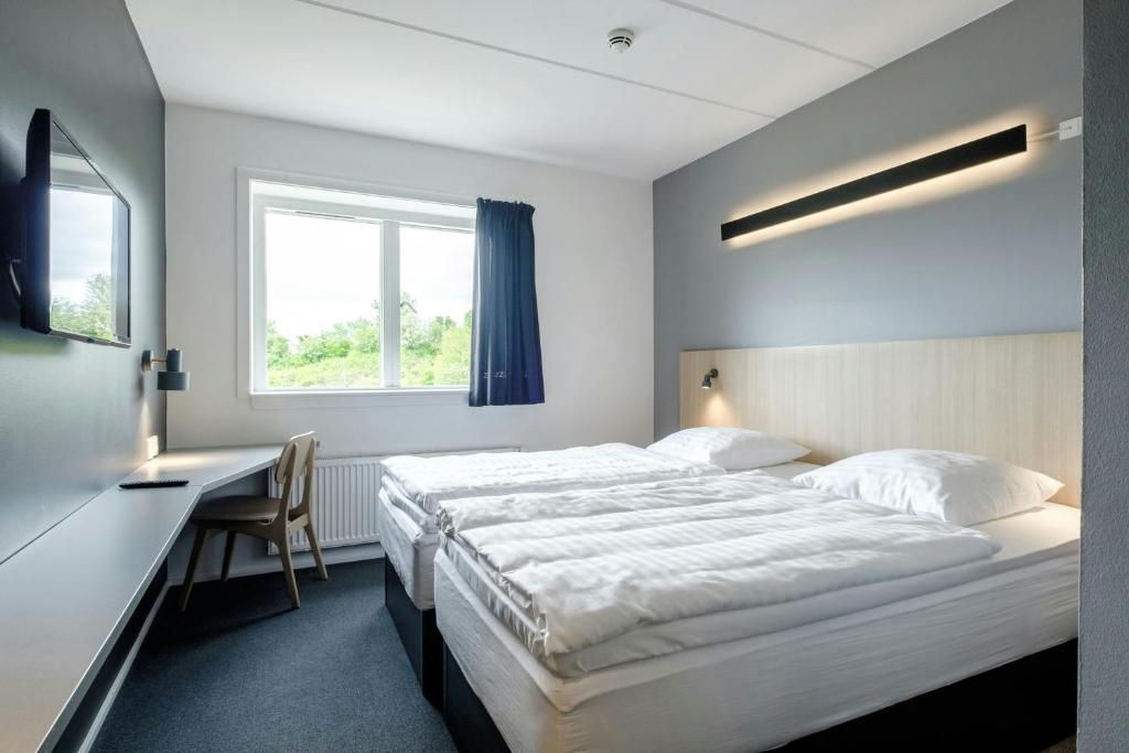 Postel nebo postele na pokoji v ubytování Four Points Flex by Sheraton Ballerup