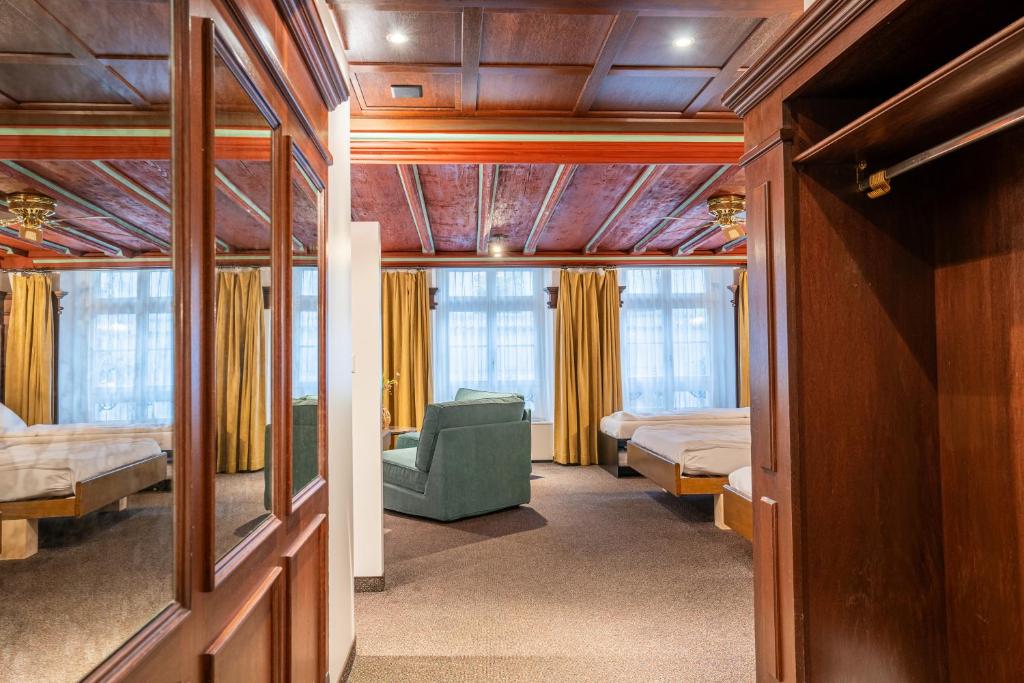 Postel nebo postele na pokoji v ubytování Hotel Baslertor