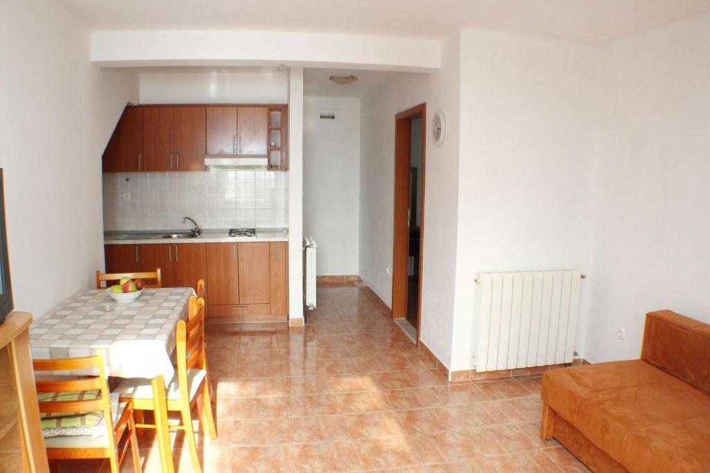 Kuchyňa alebo kuchynka v ubytovaní Apartments Sea View