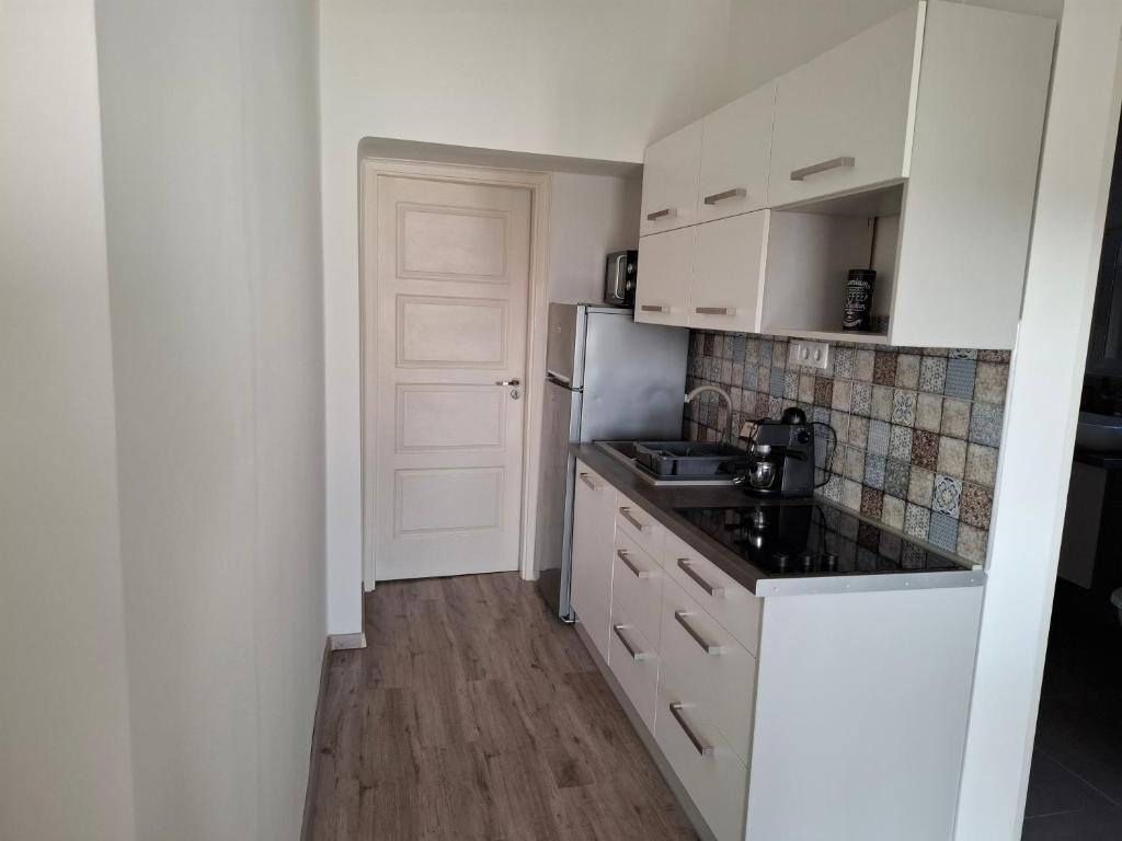 Kuchyň nebo kuchyňský kout v ubytování Werner Apartman