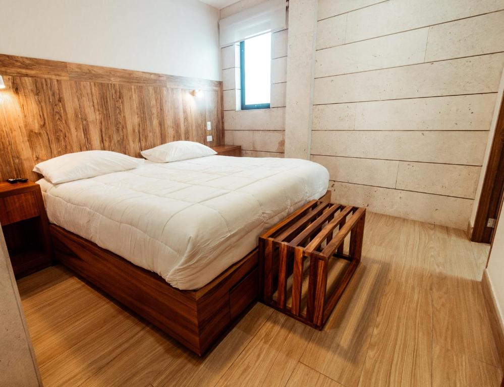 Postel nebo postele na pokoji v ubytování Xoza Hotel Urban Escape