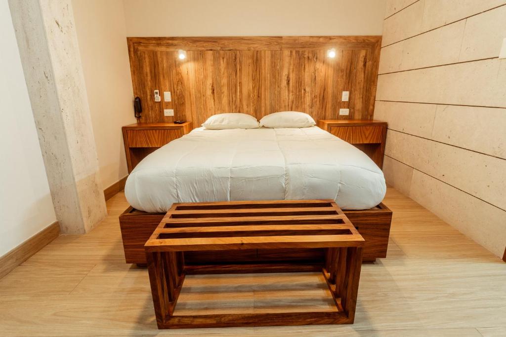 Postel nebo postele na pokoji v ubytování Xoza Hotel Urban Escape