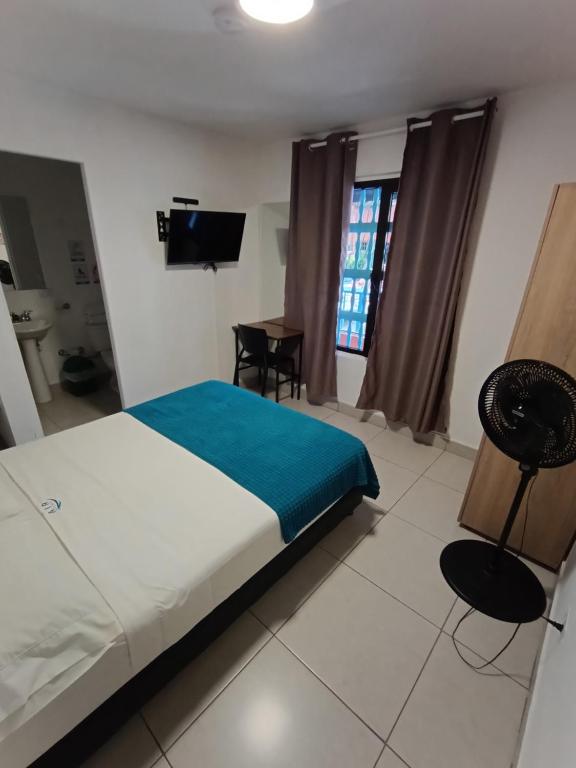 Postel nebo postele na pokoji v ubytování Air Guest House