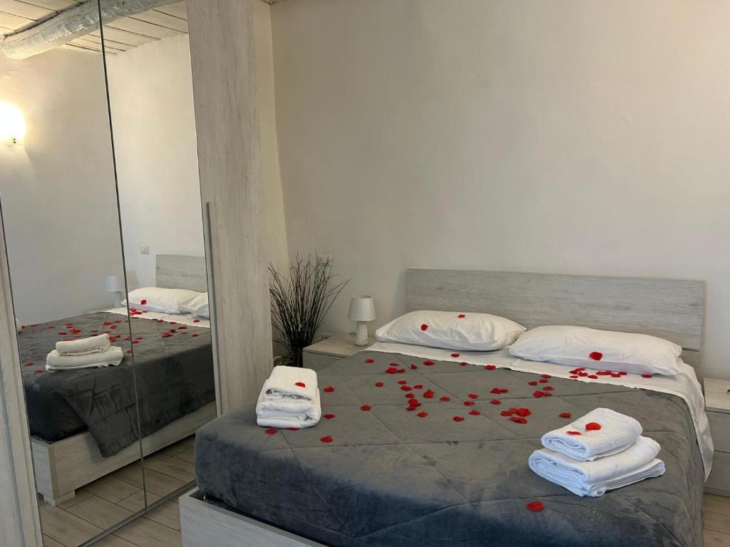 Postel nebo postele na pokoji v ubytování CASA BORGIA