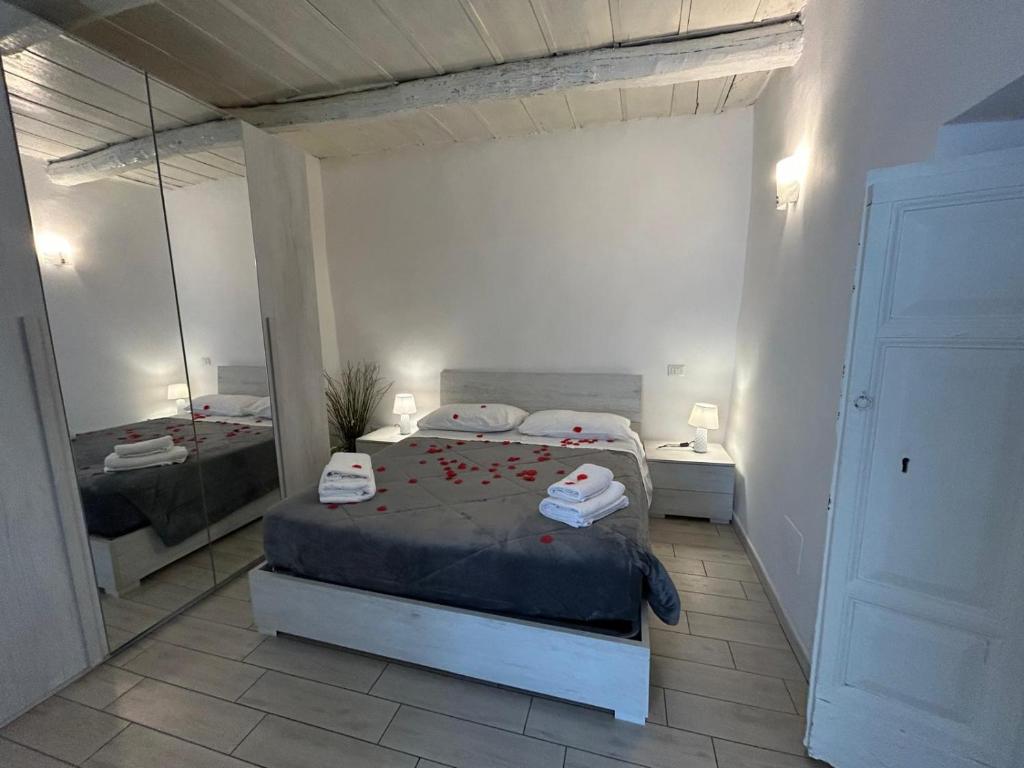 Postel nebo postele na pokoji v ubytování CASA BORGIA