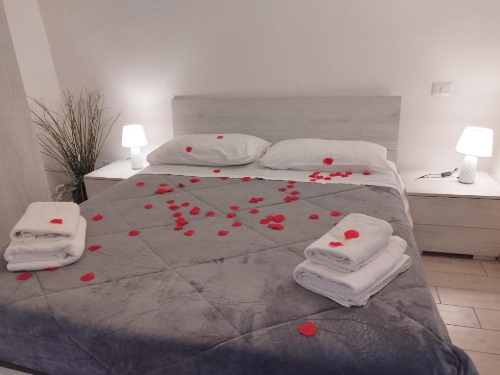 Postel nebo postele na pokoji v ubytování CASA BORGIA