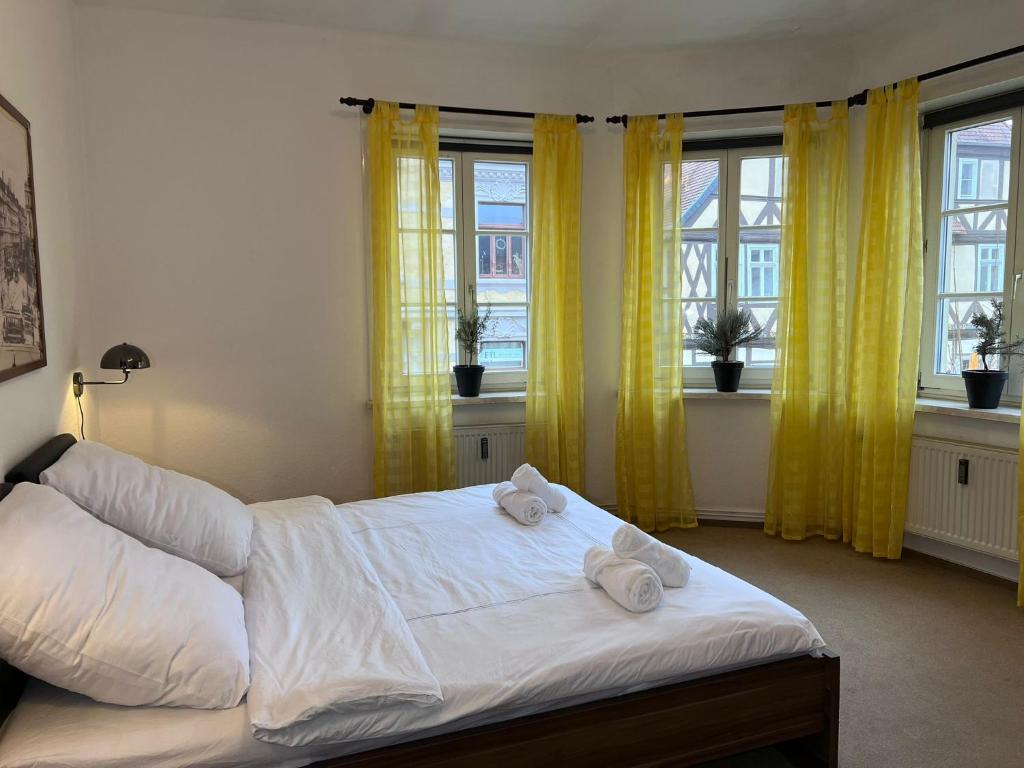 Postel nebo postele na pokoji v ubytování Hotel Doko Gardelegen