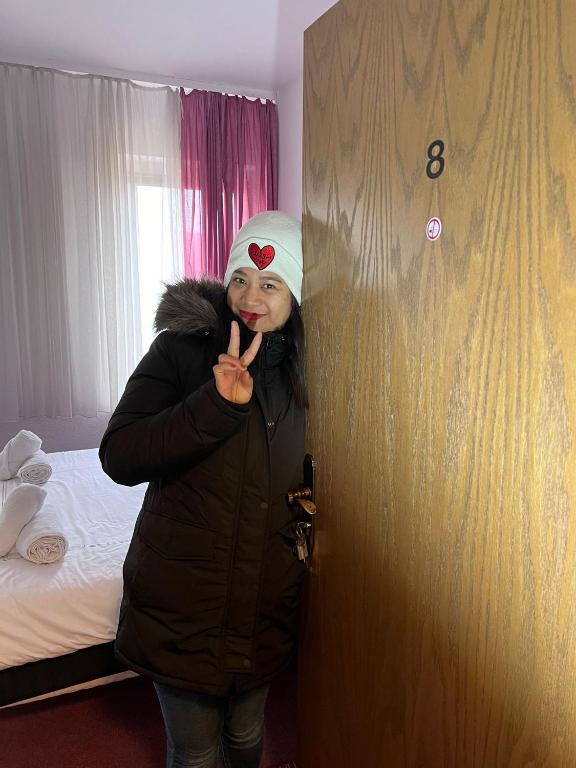 Postel nebo postele na pokoji v ubytování Hotel Doko Gardelegen