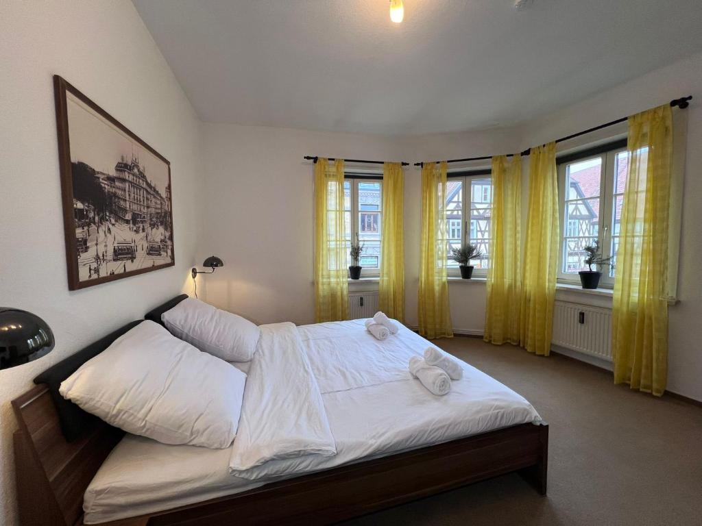 Postel nebo postele na pokoji v ubytování Hotel Doko Gardelegen