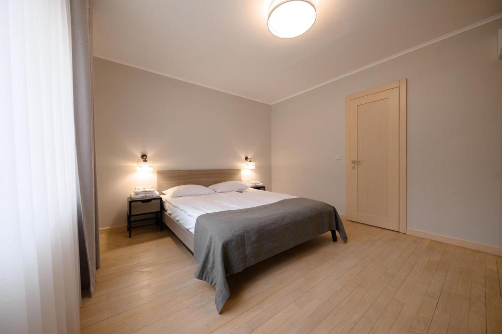 Postel nebo postele na pokoji v ubytování Voevodyno Resort