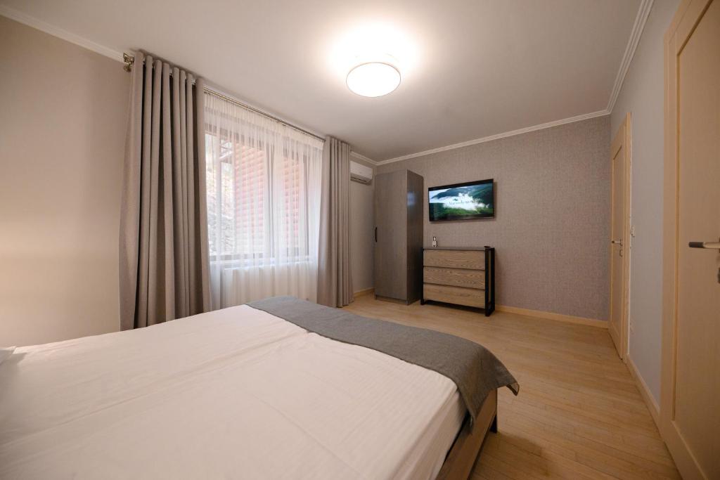 Postel nebo postele na pokoji v ubytování Voevodyno Resort