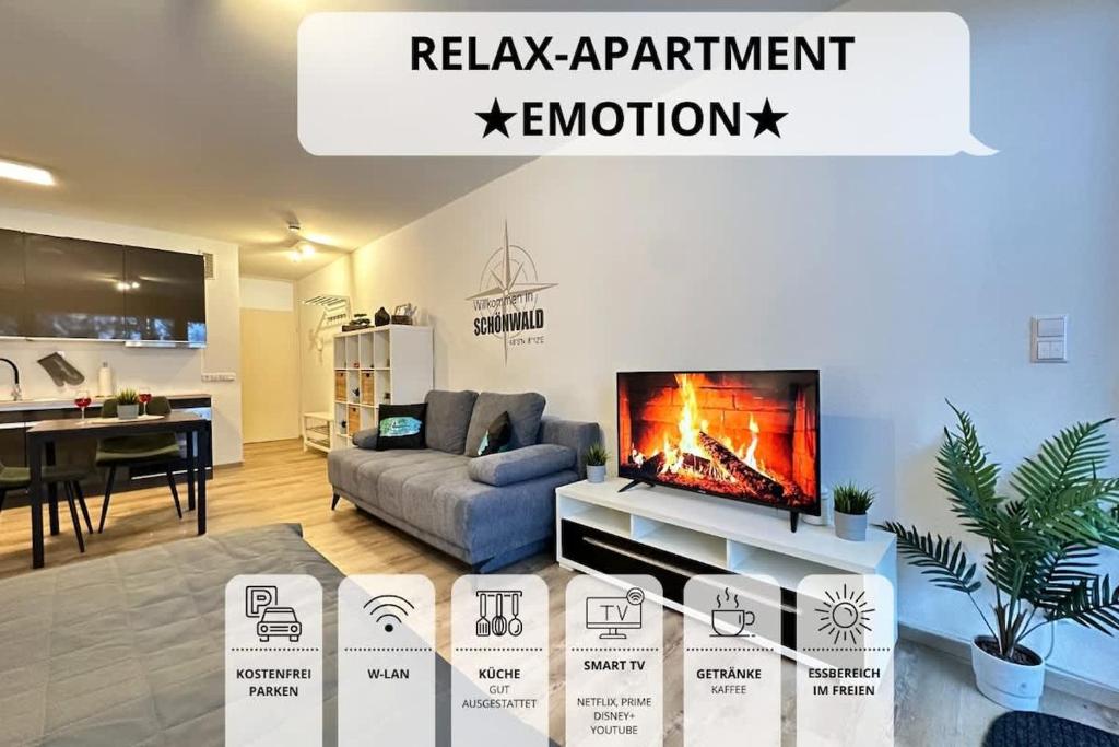 Μια τηλεόραση ή/και κέντρο ψυχαγωγίας στο RelaxApartments BLACK FOREST EMOTION mit Sonnenbalkon mit Blick auf den Kurpark, schnelles Internet, Nähe Triberger Wasserfälle, für bis zu 2 Personen