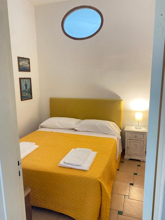 Un ou plusieurs lits dans un hébergement de l'établissement Positano's Flats