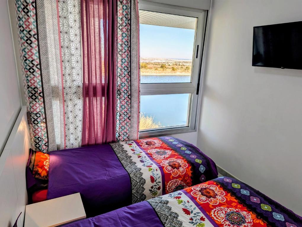 Postel nebo postele na pokoji v ubytování Villa Martin