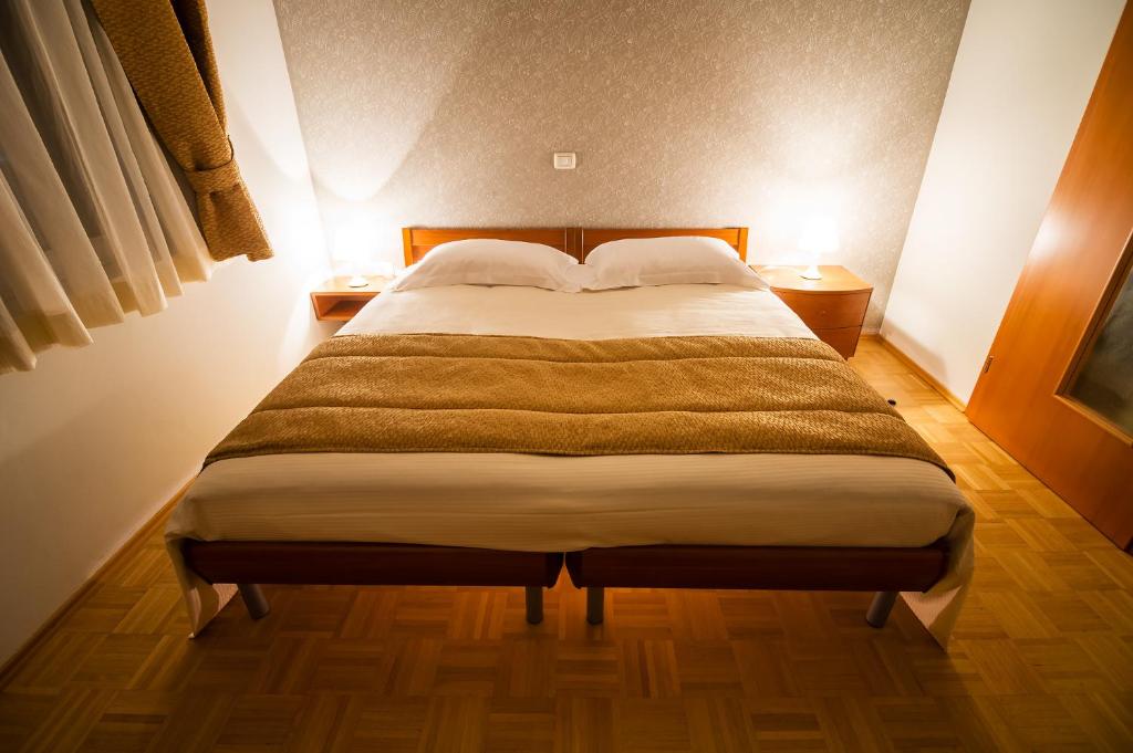 Postel nebo postele na pokoji v ubytování Primula Accommodation