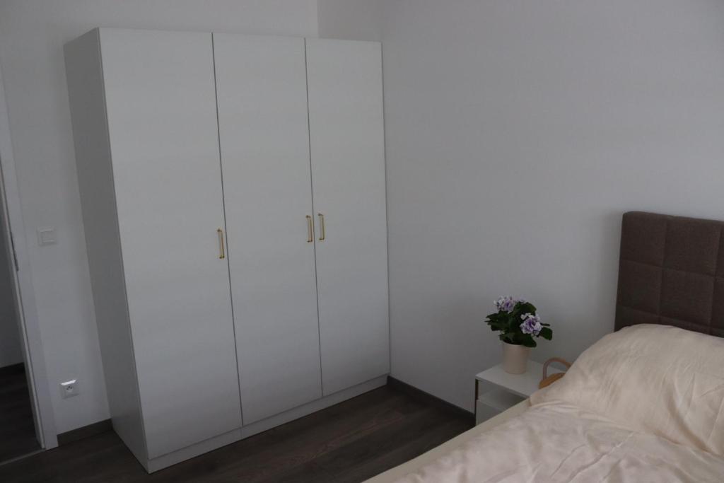 Postel nebo postele na pokoji v ubytování Apartmán Nerudova Zahrada