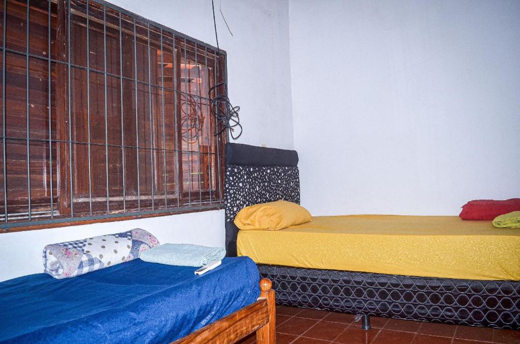 Postel nebo postele na pokoji v ubytování Hospedaje Don Evaristo