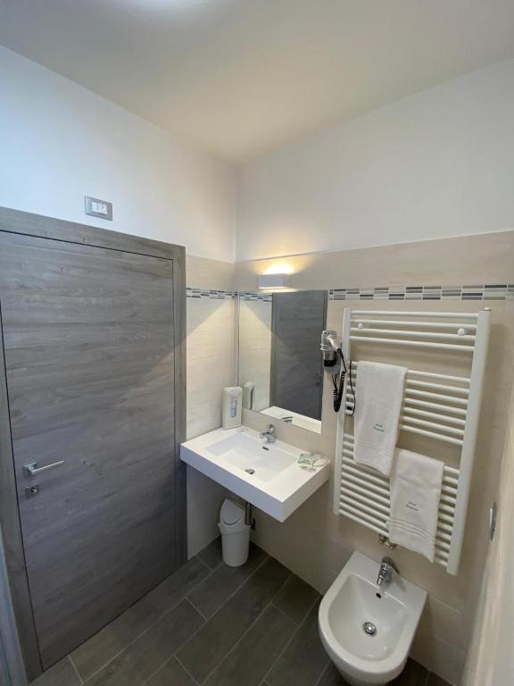 Koupelna v ubytování Hotel Camoscio