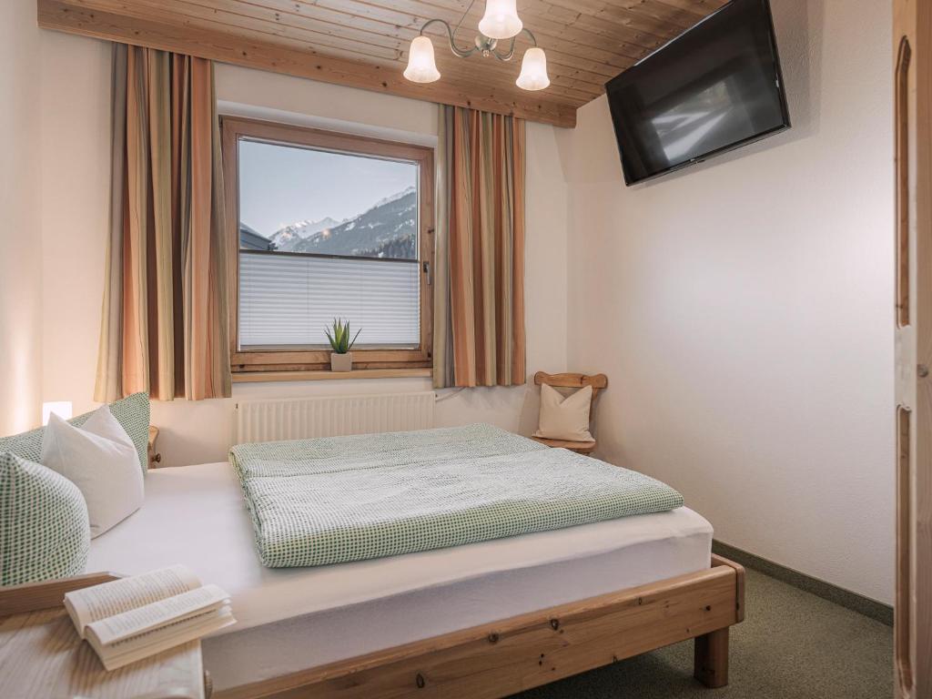 Postel nebo postele na pokoji v ubytování Appartement Geisler