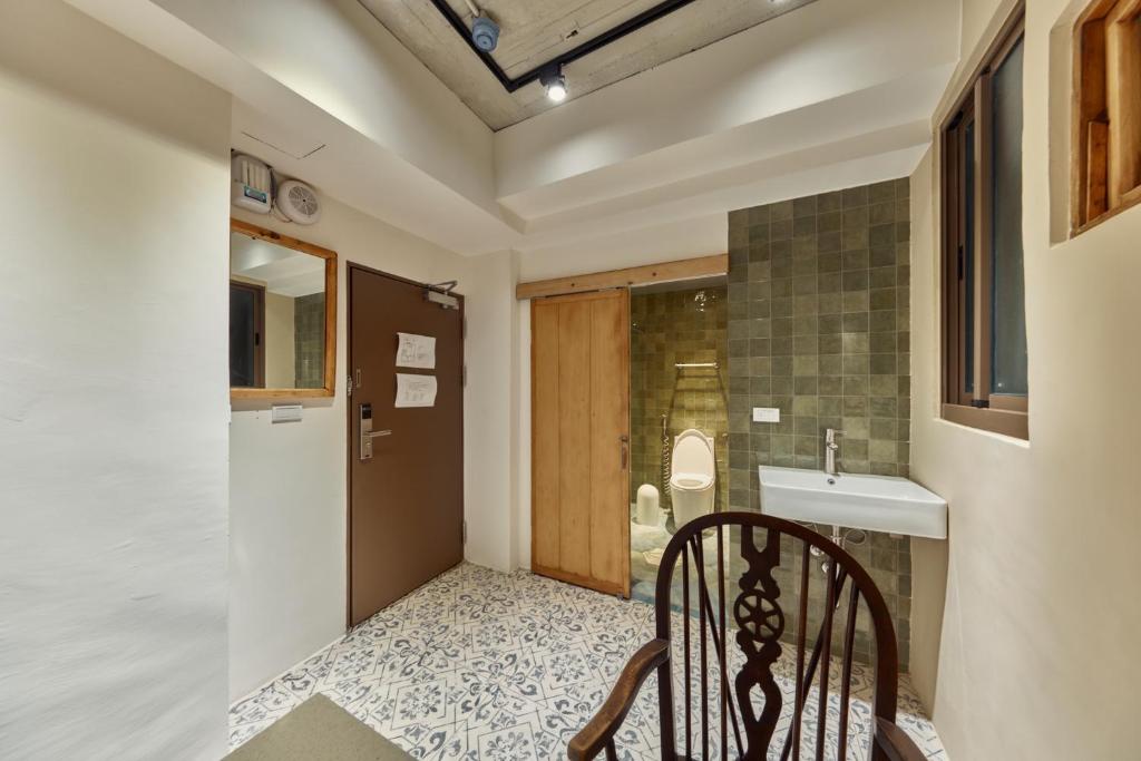 Kuchyň nebo kuchyňský kout v ubytování Sanhe Hotel