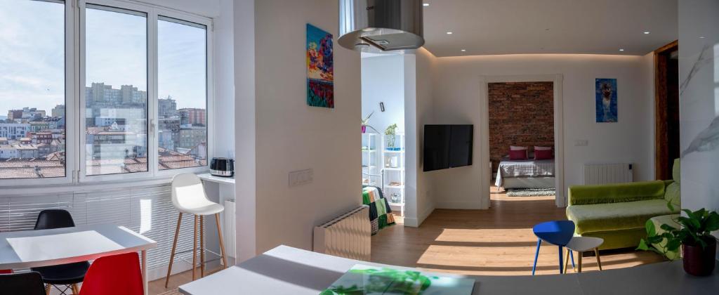 TV a/nebo společenská místnost v ubytování Cómodo y Moderno piso en el centro de Santander